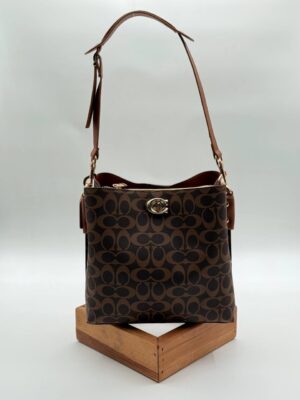 Coach monogram kilitli büzgülü kahve taba çanta