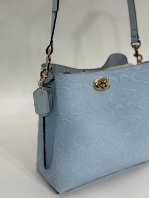 Coach Gofraj baskılı kilitli büzgülü mavi çanta