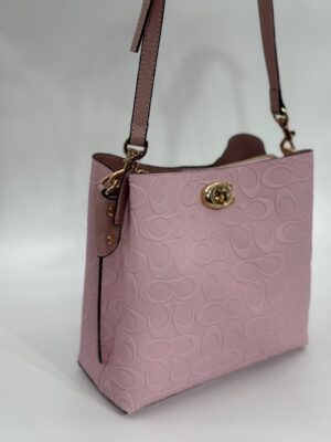 Coach Gofraj baskılı kilitli büzgülü pembe çanta