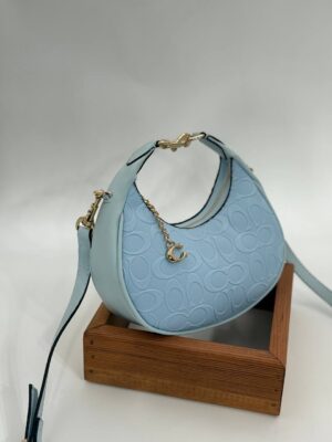 Coach Gofraj ay modeli orta boy mavi çanta