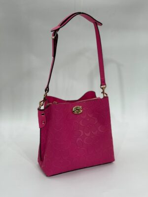 Coach Gofraj baskılı kilitli büzgülü fuşya çanta